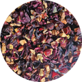 Mezcla de infusión de maracuyá y naranja con pétalos secos y trozos de frutas en tonos rojos, naranjas y morados.