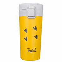 Termo amarillo de acero inox con tapa blanca, corazones negros y texto Teytal.