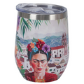 Vaso térmico de acero con diseño colorido de Frida Kahlo y paisaje urbano de fondo.
