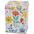 Lata metálica blanca con flores grandes multicolores y tapa cuadrada ajustada.